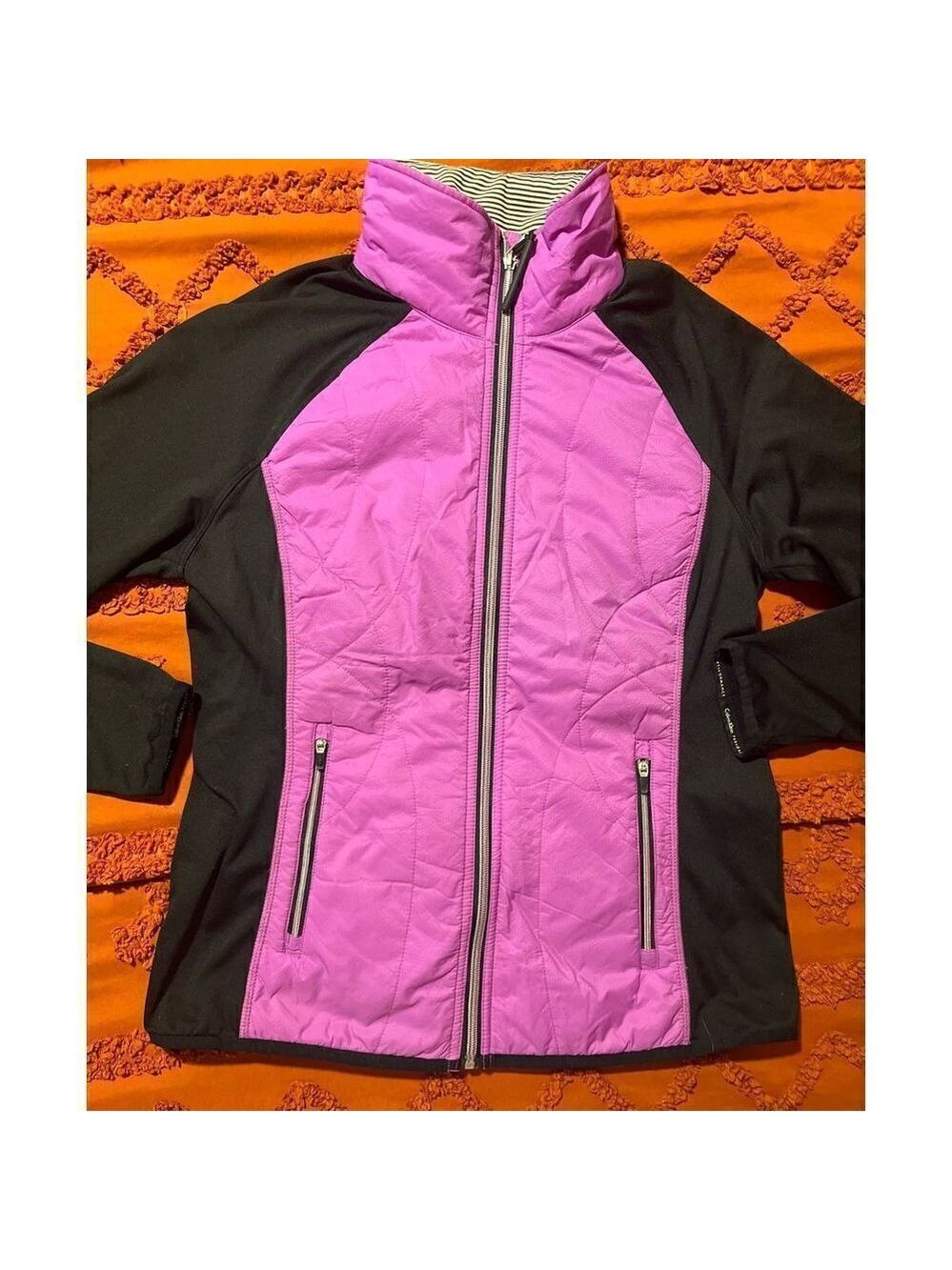 Calvin Klein purple/black jacket. Size medium . Zipper, smartphone pocke…